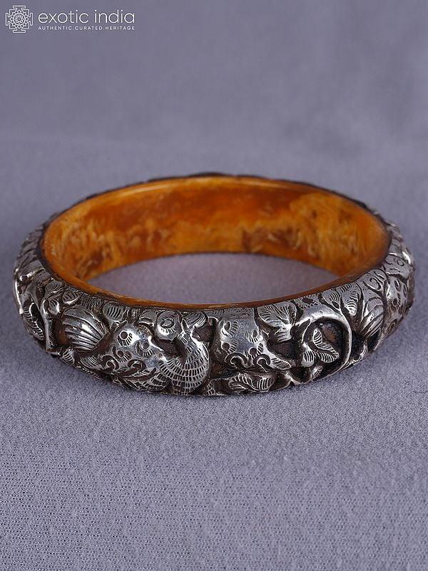 Exotic India 3.5" Engraved Designer Amber And Silver Bangle From Nepal
