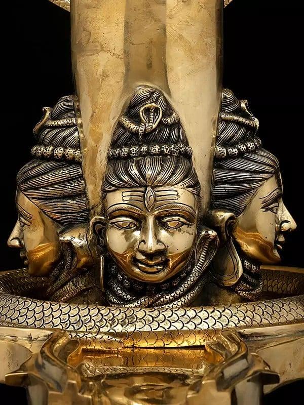 Exotic India 30" Brass Shivalingam With Four Shiva Faces And Protected By Nine Hooded Serpent 