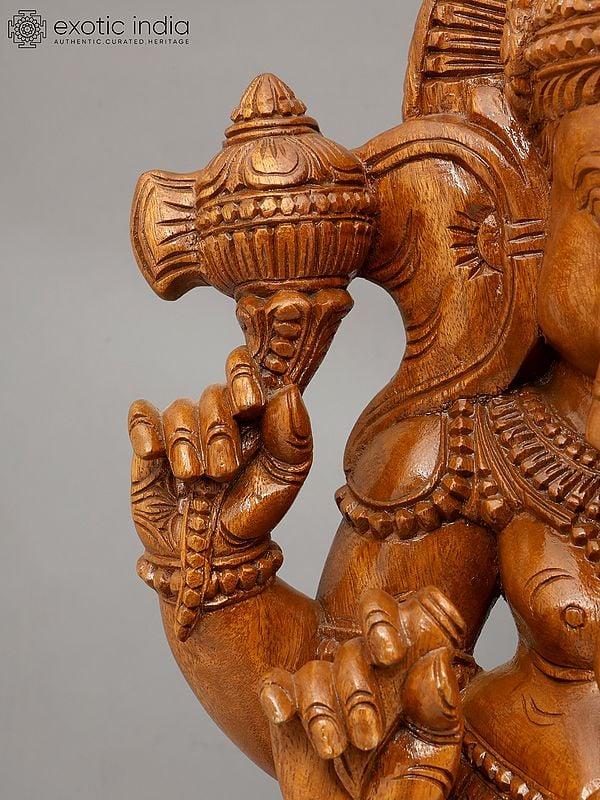 Exotic India 30" Chaturbhuja Lord Ganesha Seated On Lotus | Wood Carving 