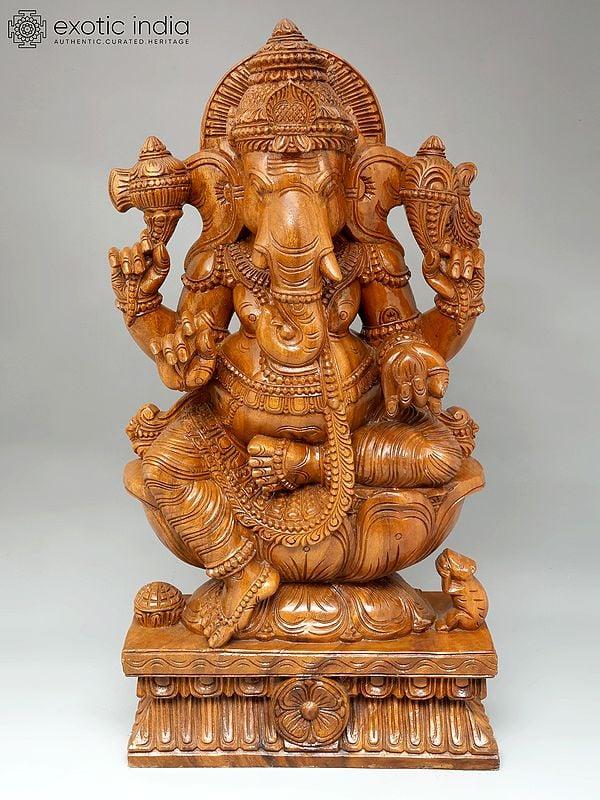 exotic india 30" Chaturbhuja Lord Ganesha Seated on Lotus | Wood Carving 