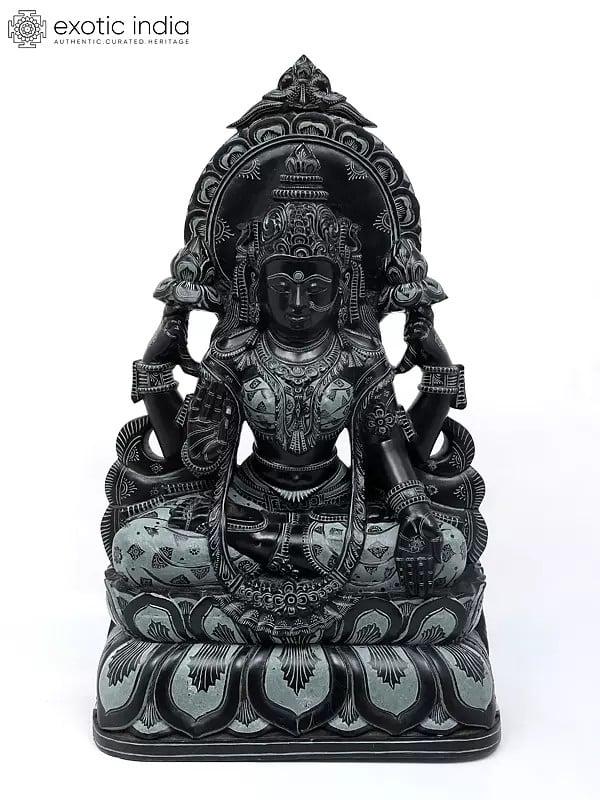 exotic india 30" Large Sitting Goddess Lakshmi | Sand Stone Statue | Made in Orissa 