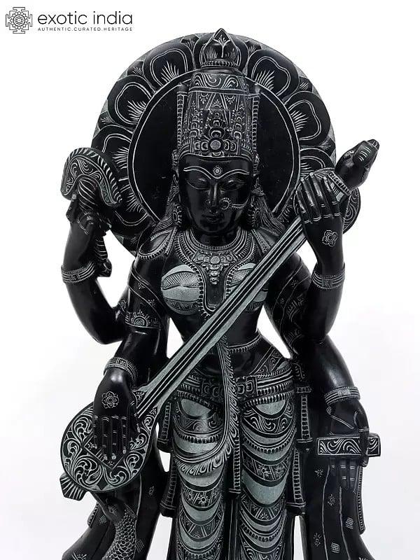 Exotic India 32" Large Standing Goddess Saraswati Playing Veena | Sand Stone Statue From The Land Of Lord Jagannath Orissa 