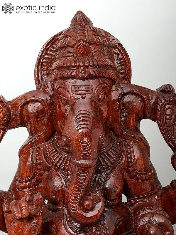 Exotic India 36" Large Four Armed Lord Ganesha Seated On Lotus | Wood Carving 