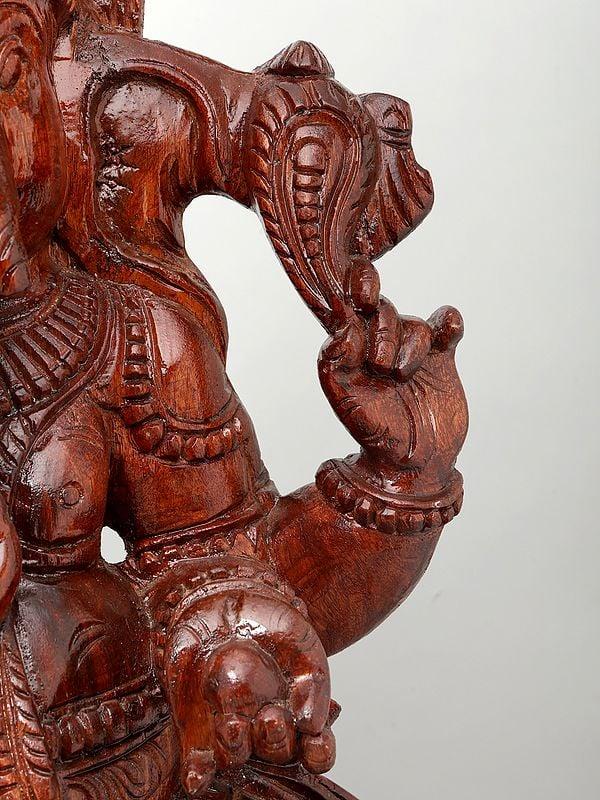 Exotic India 36" Large Four Armed Lord Ganesha Seated On Lotus | Wood Carving 