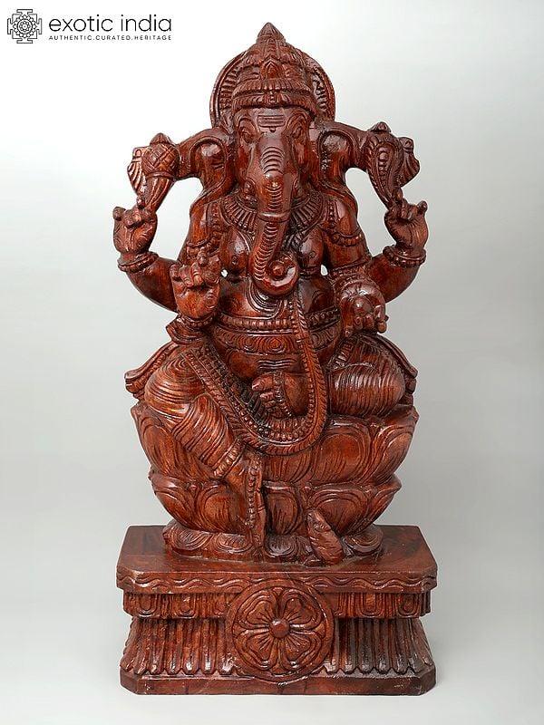 exotic india 36" Large Four Armed Lord Ganesha Seated on Lotus | Wood Carving 
