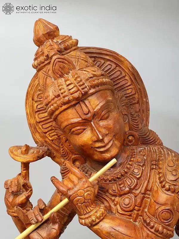 Exotic India 36" Large Four Armed Sitting Lord Krishna Playing Flute | Wood Carving 