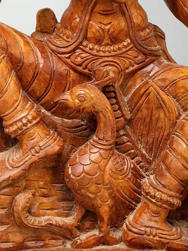 Exotic India 36" Large Four Armed Sitting Lord Krishna Playing Flute | Wood Carving 