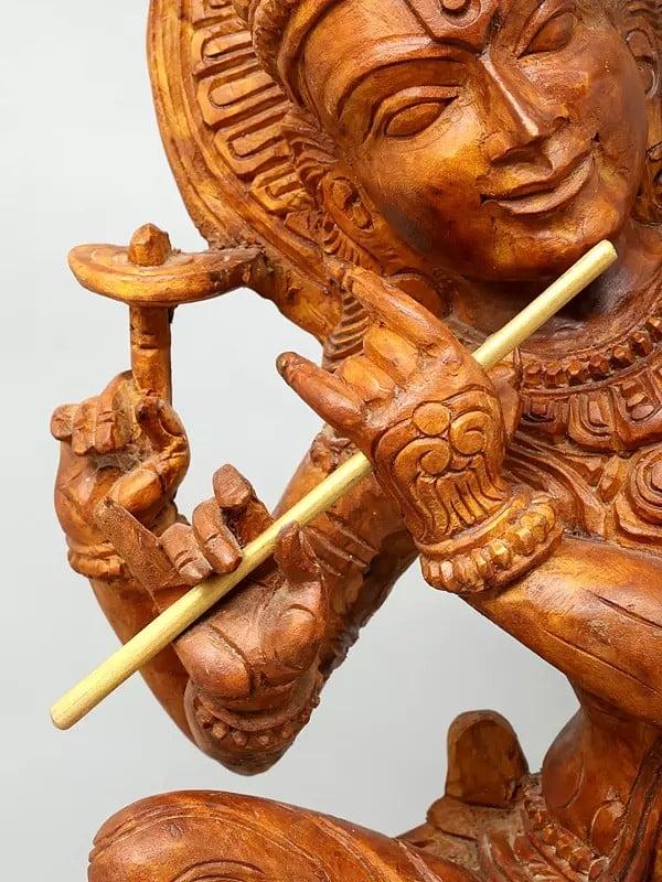 Exotic India 36" Large Four Armed Sitting Lord Krishna Playing Flute | Wood Carving 