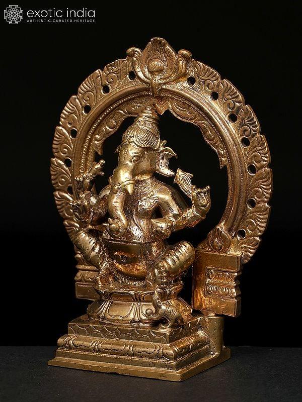 Exotic India 4" Small Four Armed Lord Ganesha Seated On Throne | Madhuchista Vidhana (Lost-Wax) | Panchaloha Bronze From Swamimalai 