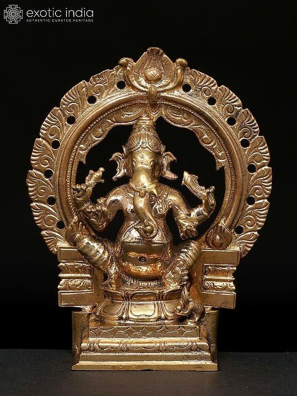 exotic india 4" Small Four Armed Lord Ganesha Seated on Throne | Madhuchista Vidhana (Lost-Wax) | Panchaloha Bronze from Swamimalai 