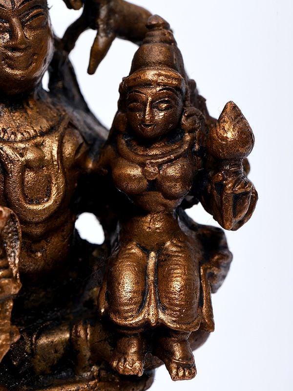 Exotic India 4" Small Pradosha Moorthy (Shiva Parvati Seated On Nandi) | Copper Statue 