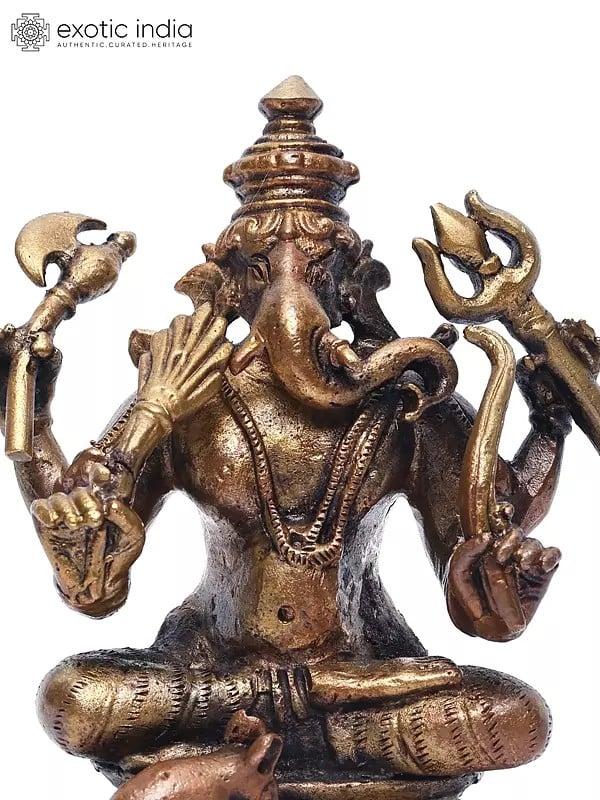 Exotic India 4" Small Sitting Lord Ganapati With Mushak | Copper Statue 