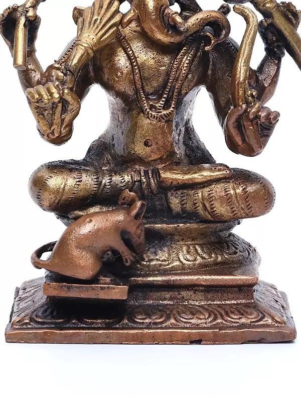 Exotic India 4" Small Sitting Lord Ganapati With Mushak | Copper Statue 