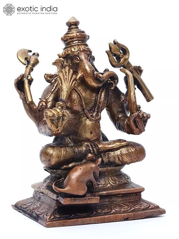 Exotic India 4" Small Sitting Lord Ganapati With Mushak | Copper Statue 