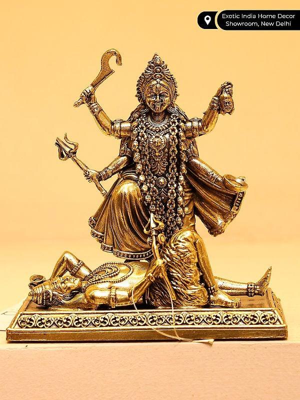 Exotic India 4" Small Superfine Goddess Kali Standing On Lord Shiva | Brass Statue 