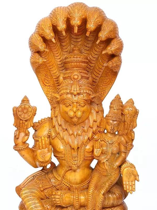 Exotic India 46" Lord Narasimha Seated On Sheshnag With Devi Lakshmi | Wood Carving 