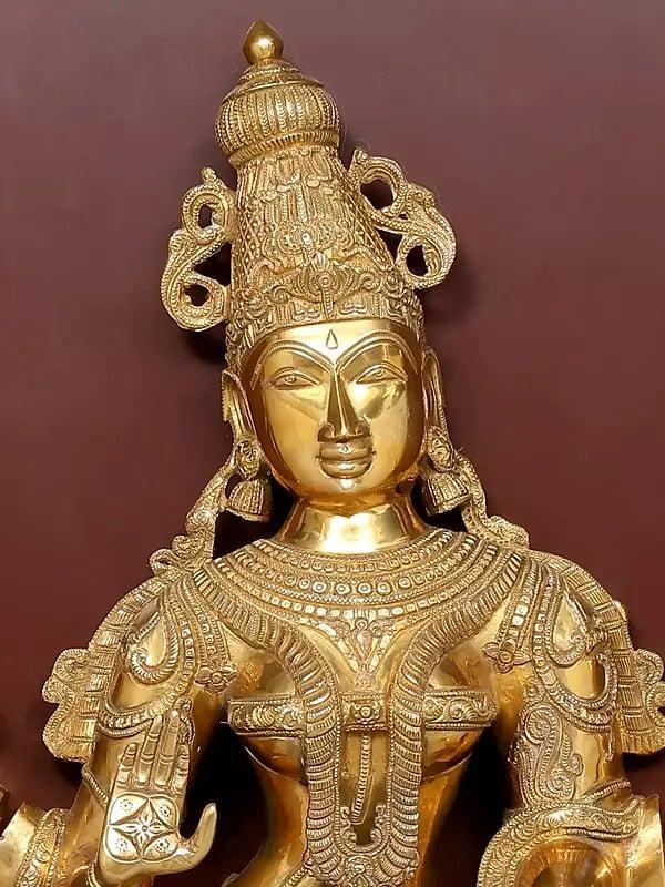 Exotic India 48" Large Four Armed Standing Goddess Lakshmi | Wood Framed Brass Sculpture | Wall Hanging 