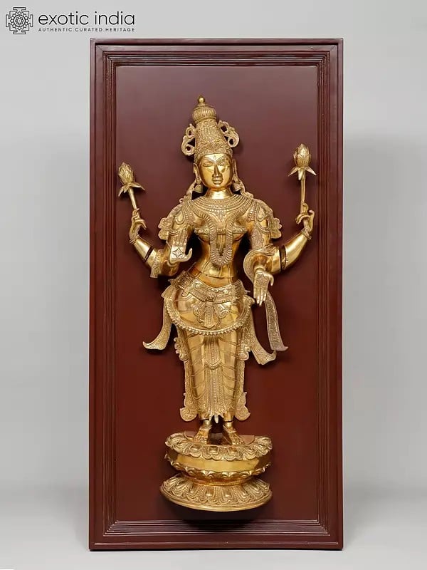 exotic india 48" Large Four Armed Standing Goddess Lakshmi | Wood Framed Brass Sculpture | Wall Hanging 