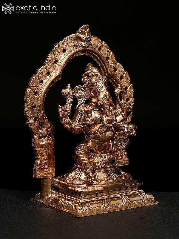 Exotic India 5" Small Chaturbhuja Lord Ganesha Seated On Kirtimukha Throne | Madhuchista Vidhana (Lost-Wax) | Panchaloha Bronze From Swamimalai 