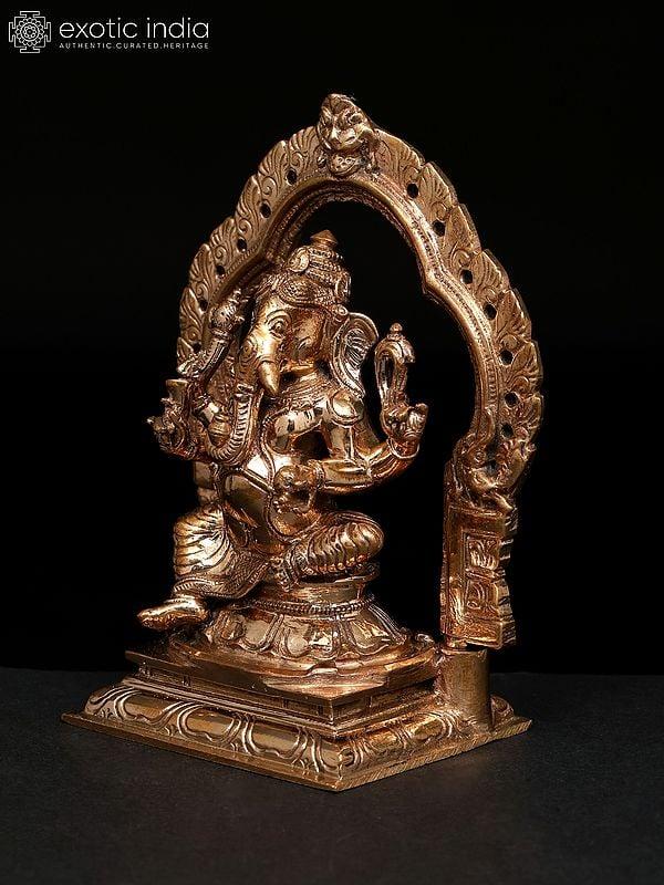 Exotic India 5" Small Chaturbhuja Lord Ganesha Seated On Kirtimukha Throne | Madhuchista Vidhana (Lost-Wax) | Panchaloha Bronze From Swamimalai 