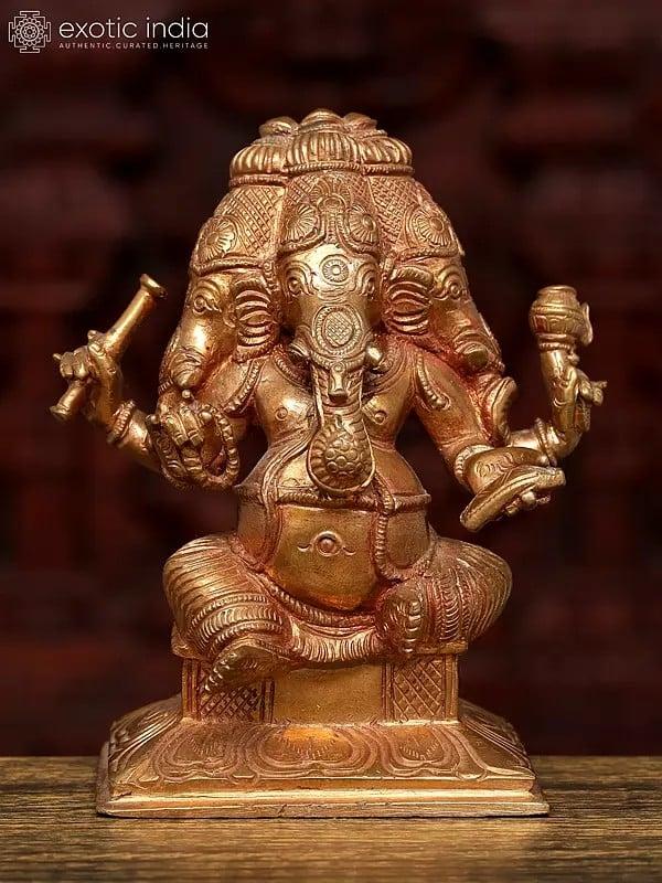 exotic india 5" Small Four Headed Sitting Lord Ganesha | Bronze Statue 