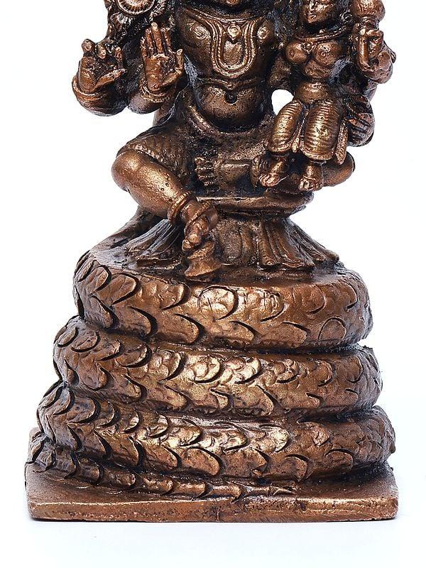 Exotic India 5" Small Lord Narasimha Seated On Serpent Throne With Devi Lakshmi | Copper Statue 