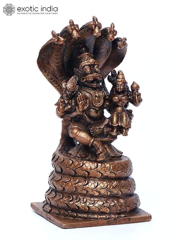 Exotic India 5" Small Lord Narasimha Seated On Serpent Throne With Devi Lakshmi | Copper Statue 