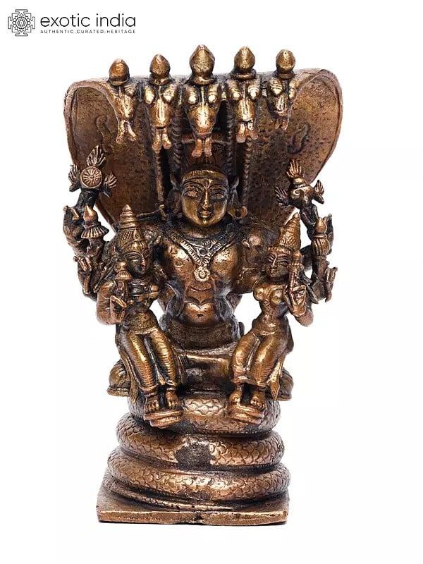 exotic india 5" Small Lord Vishnu Seated on Serpent with Sridevi and Bhudevi | Copper Statue 