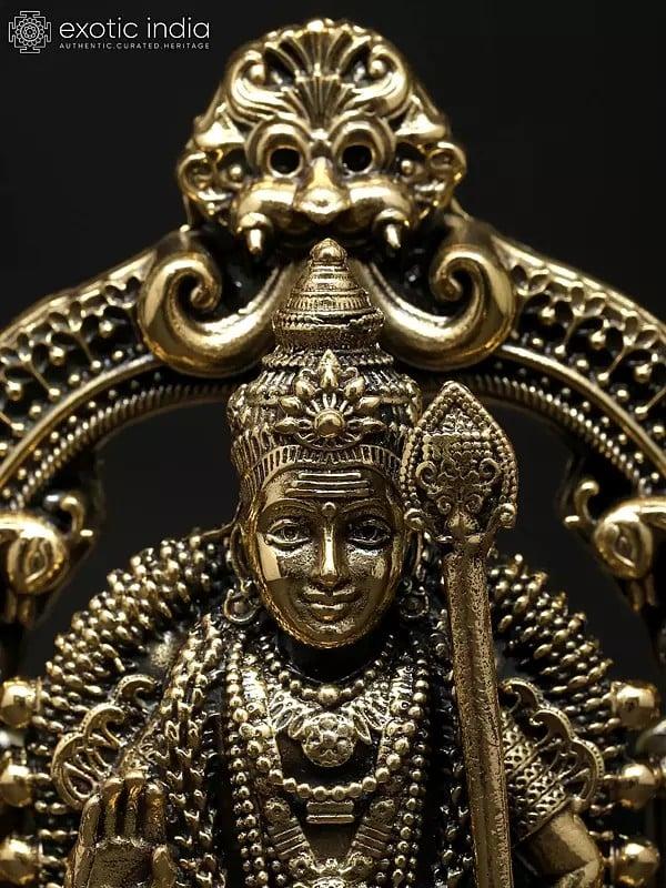 Exotic India 5" Small Superfine Standing Lord Murugan (Karttikeya) With Beautiful Kirtimukha Prabhavali | Brass Statue 