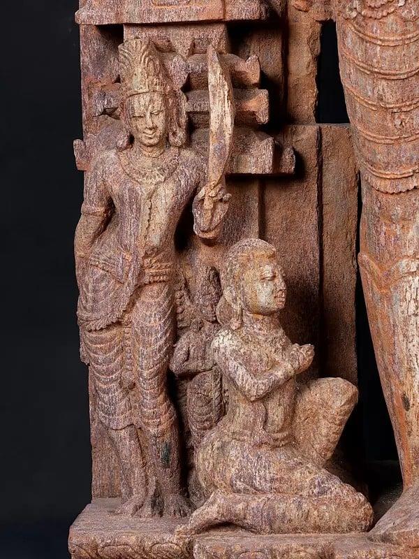 Exotic India 50" Large Standing Lord Surya Narayan Holding Two Lotuses | Khondalite Stone Sculpture | Made In Orissa 