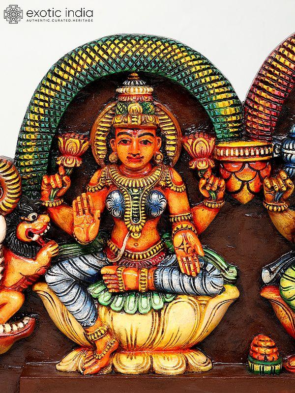 Exotic India 54" Large Lakshmi Ganesha Saraswati Colorful Wall Panel | Wood Carving 