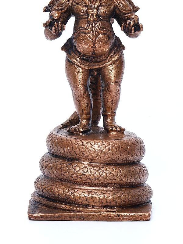 Exotic India 6" Small Bal Krishna On Kaliya Naag | Copper Statue 