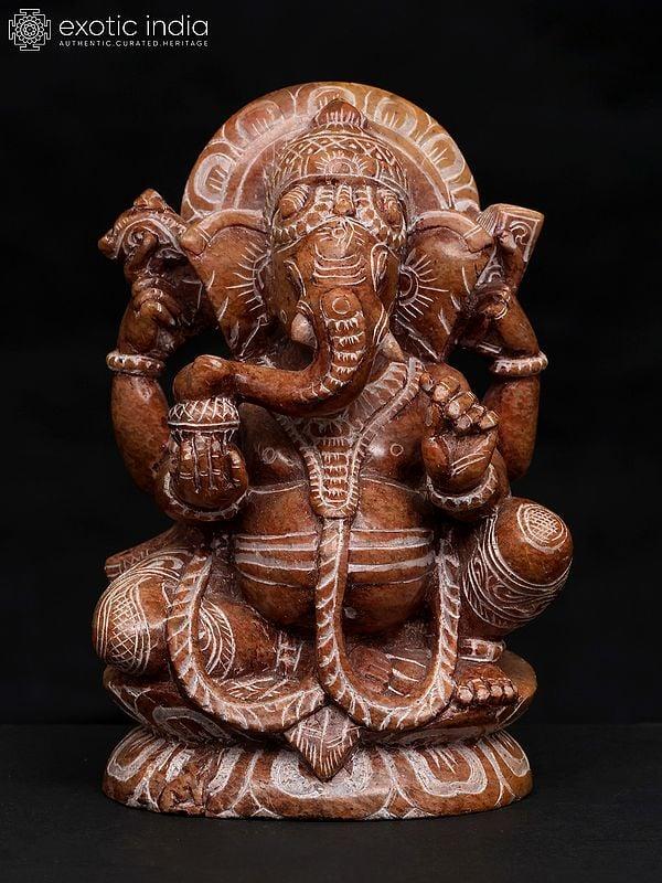 exotic india 6" Small Chaturbhuja Lord Ganesha | Sand Stone Statue | Made in Orissa 