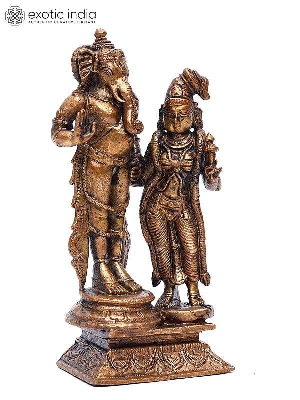 Exotic India 6" Small Standing Lord Ganesha With Devi Lakshmi | Copper Statue 