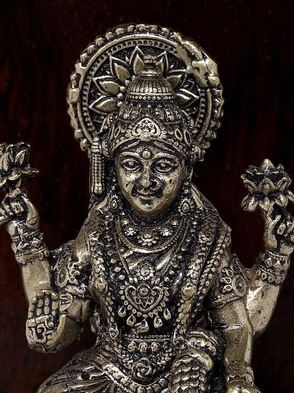 Exotic India 6" Small Superfine Goddess Lakshmi Temple | Brass Statue With Wooden Temple | Wall Hanging 