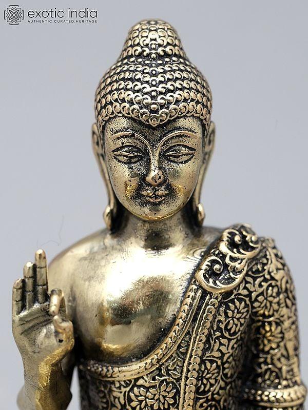 Exotic India 6" Small Superfine Lord Buddha Seated In Vitark Mudra On Wood Base | Brass Statue 