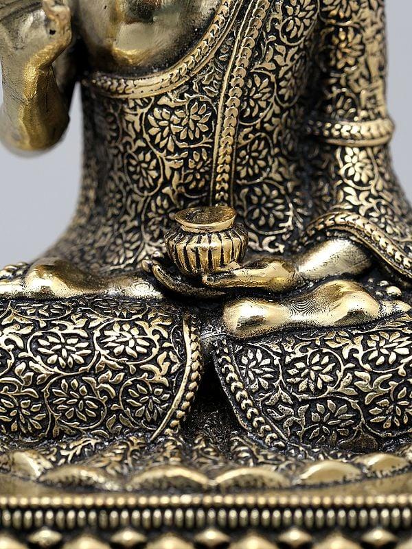 Exotic India 6" Small Superfine Lord Buddha Seated In Vitark Mudra On Wood Base | Brass Statue 