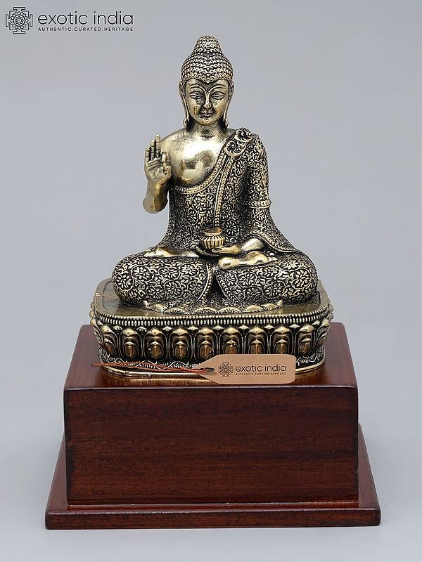 exotic india 6" Small Superfine Lord Buddha Seated in Vitark Mudra on Wood Base | Brass Statue 