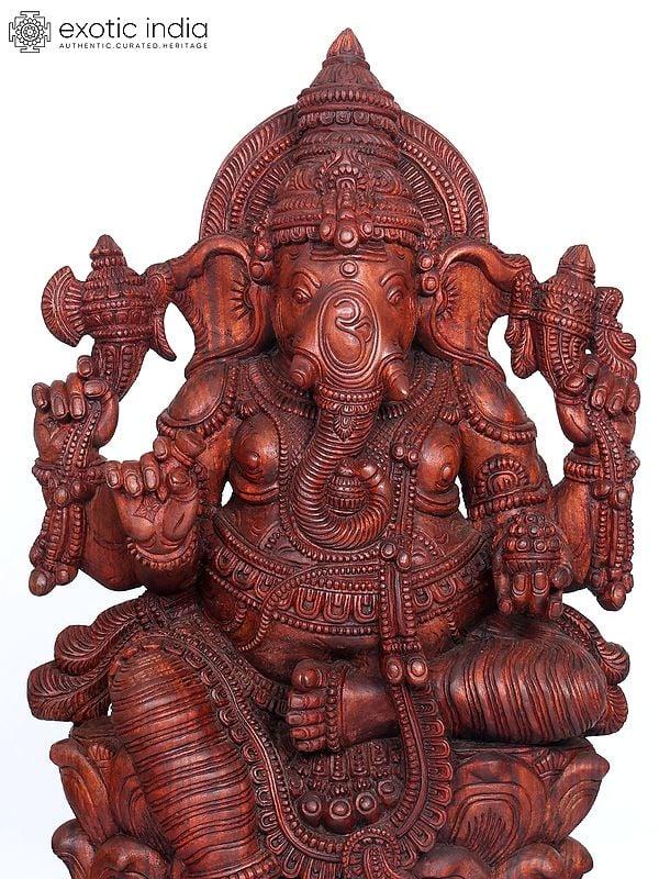 Exotic India 65" Large Four Armed Lord Ganesha Seated On Lotus | Wood Carving 