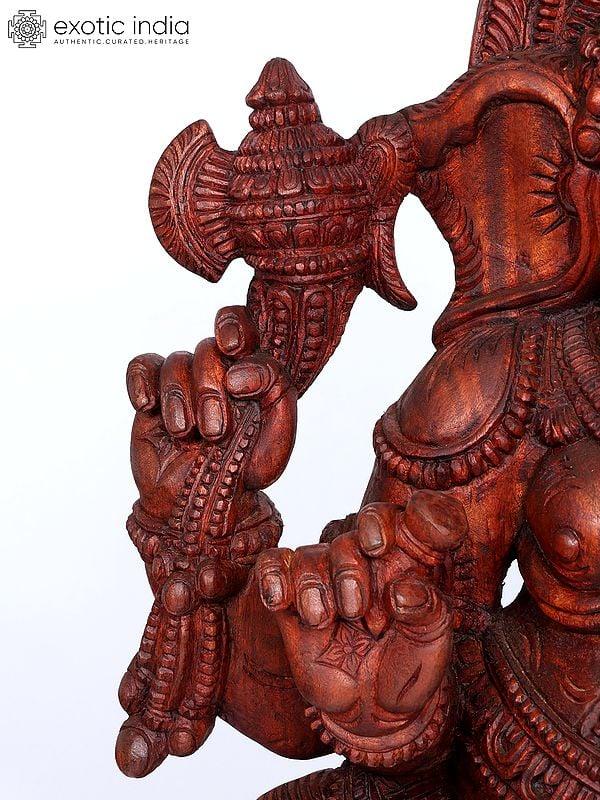 Exotic India 65" Large Four Armed Lord Ganesha Seated On Lotus | Wood Carving 