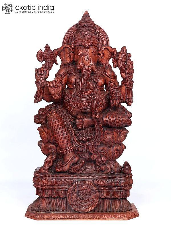 exotic india 65" Large Four Armed Lord Ganesha Seated on Lotus | Wood Carving 