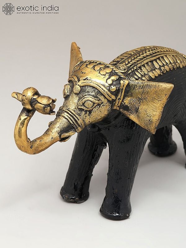 Exotic India 7" Decorative Cute Elephant Holding Flower | Dhokra Art | Table Decor 