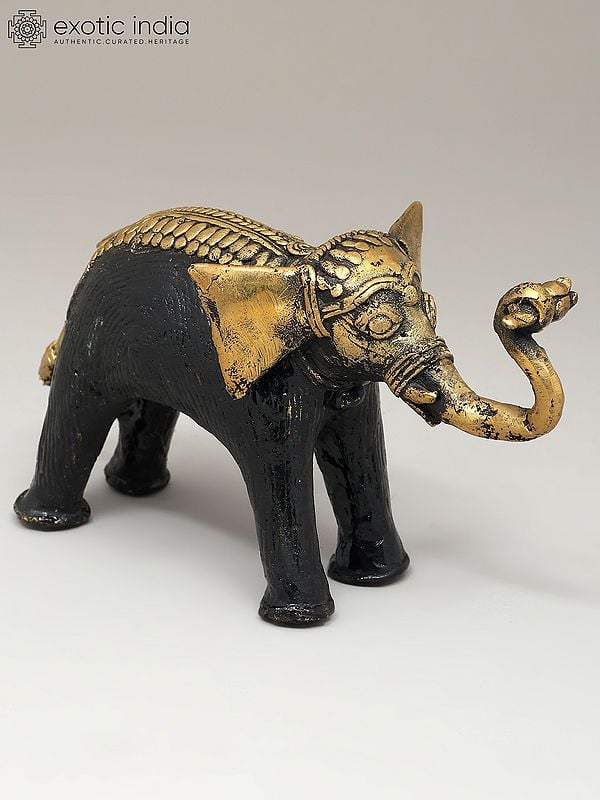 Exotic India 7" Decorative Cute Elephant Holding Flower | Dhokra Art | Table Decor 