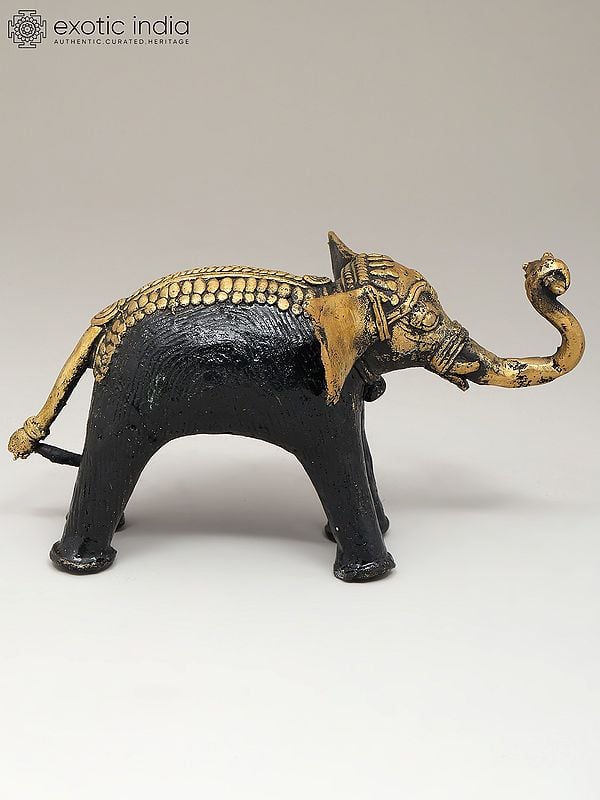 Exotic India 7" Decorative Cute Elephant Holding Flower | Dhokra Art | Table Decor 
