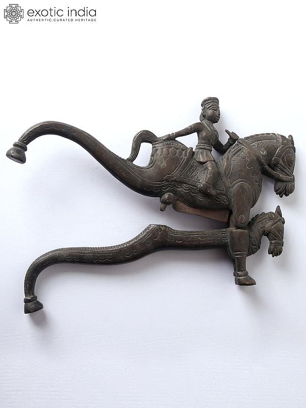 Exotic India 7" King Riding On Horse Design Sarota/Nut Cracker In Bronze