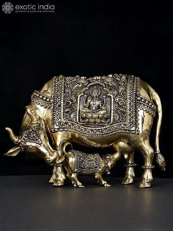 exotic india 7" Superfine Divine Cow and Calf with Lakshmi Ganesha Engraving | Brass Statue 
