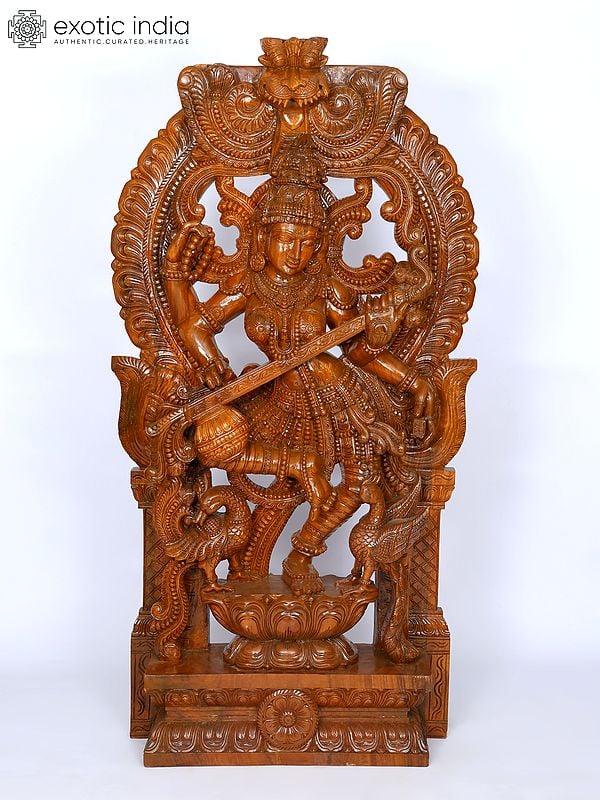 exotic india 72" Dancing Goddess Saraswati with Kirtimukha Arch | Wood Carving 