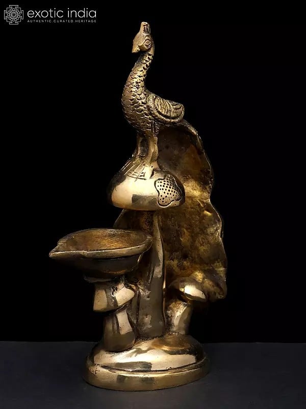 Exotic India 8" Beautiful Peacock With Diya | Brass Statue