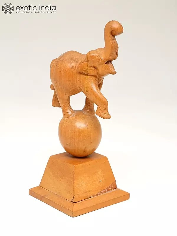 Exotic India 8" Elephant Playing With Ball | Wood Home Decor Item 