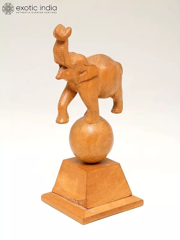 Exotic India 8" Elephant Playing With Ball | Wood Home Decor Item 